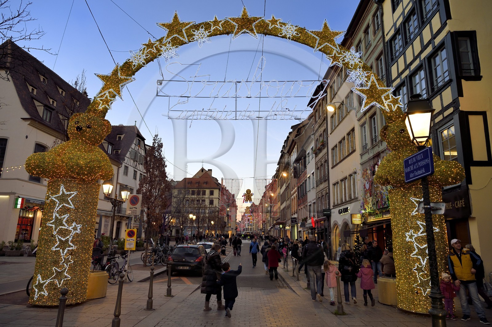 France, Bas Rhin, Strasbourg, old town listed as World Heritage by UNESCO, the large arch - Strasbourg, Capital of Christmas - located at the entrance of the rue du Vieux Marché aux Poissons