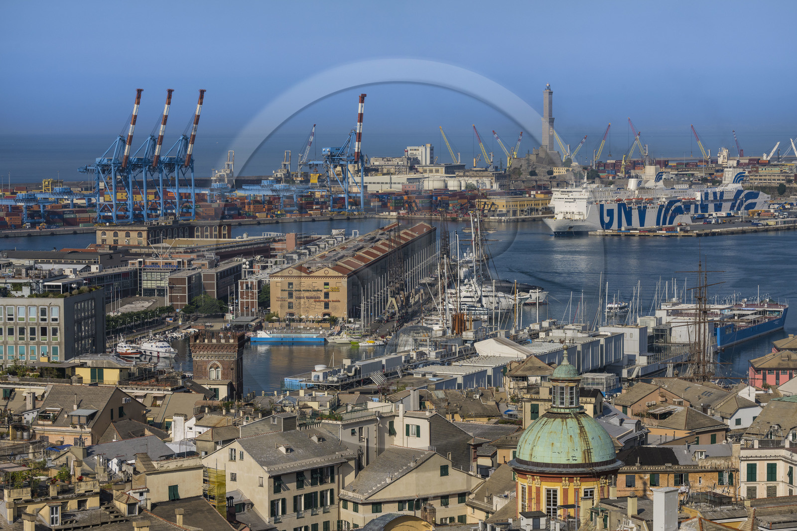 Italy, Liguria, Genoa, the Porto Antico (Old Port) seen from from the Belvedere of Castelletto, the commercial port in the background dominated by the Lanterna lighthouse