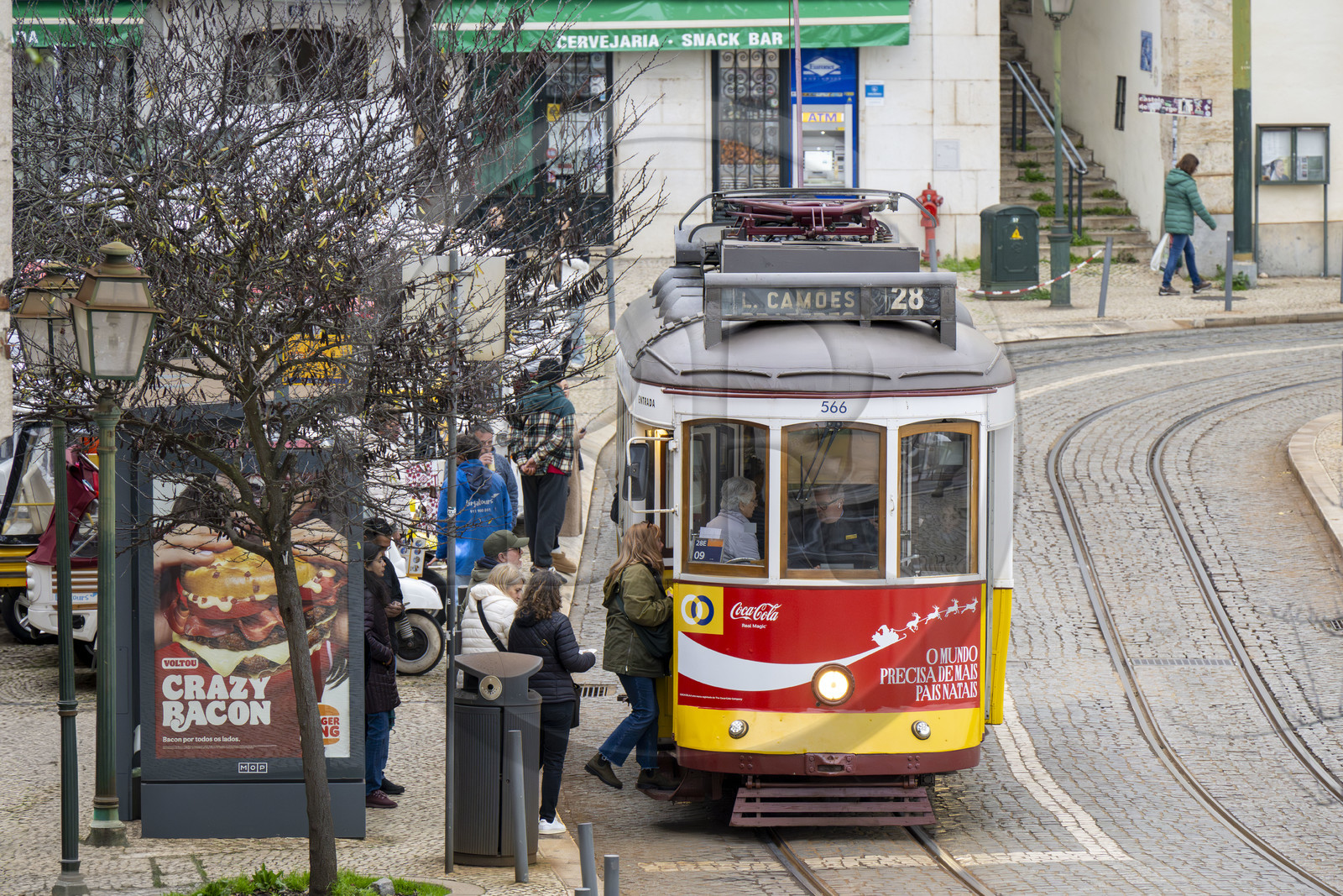 Portugal, Lisbon, Alfama district, tram (electricos) at the Largo das Portas do Sol, line 28 is the most famous and picturesque