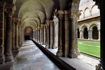 France, Haute Loire, Le Puy en Velay, Routes of Santiago de Compostela, the 12th century Our Lady (Notre-Dame-de-l'Annunciation) cathedral listed as World heritage by UNESCO, the cloister decorated with polychrome arcades