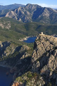 France, Corse du Sud, Golfe de Porto, listed as World Heritage by UNESCO, the Capo Rosso and the Genovese Tower of Turghiu (Turghio) in the background (aerial view)