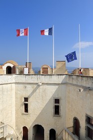 France, Var, Saint-Tropez, 16th century citadel which houses the maritime history museum, flag raising over the dungeon court