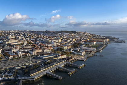 Portugal, Lisbon, Cais do Sodre district at the foot of Bairro Alto and Chiado, in the foreground on the left the Mercado da Ribeira (Time Out Market Lisboa) and the train station (aerial view)