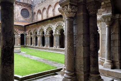 France, Haute Loire, Le Puy en Velay, Routes of Santiago de Compostela, the 12th century Our Lady (Notre-Dame-de-l'Annunciation) cathedral listed as World heritage by UNESCO, the cloister decorated with polychrome arcades