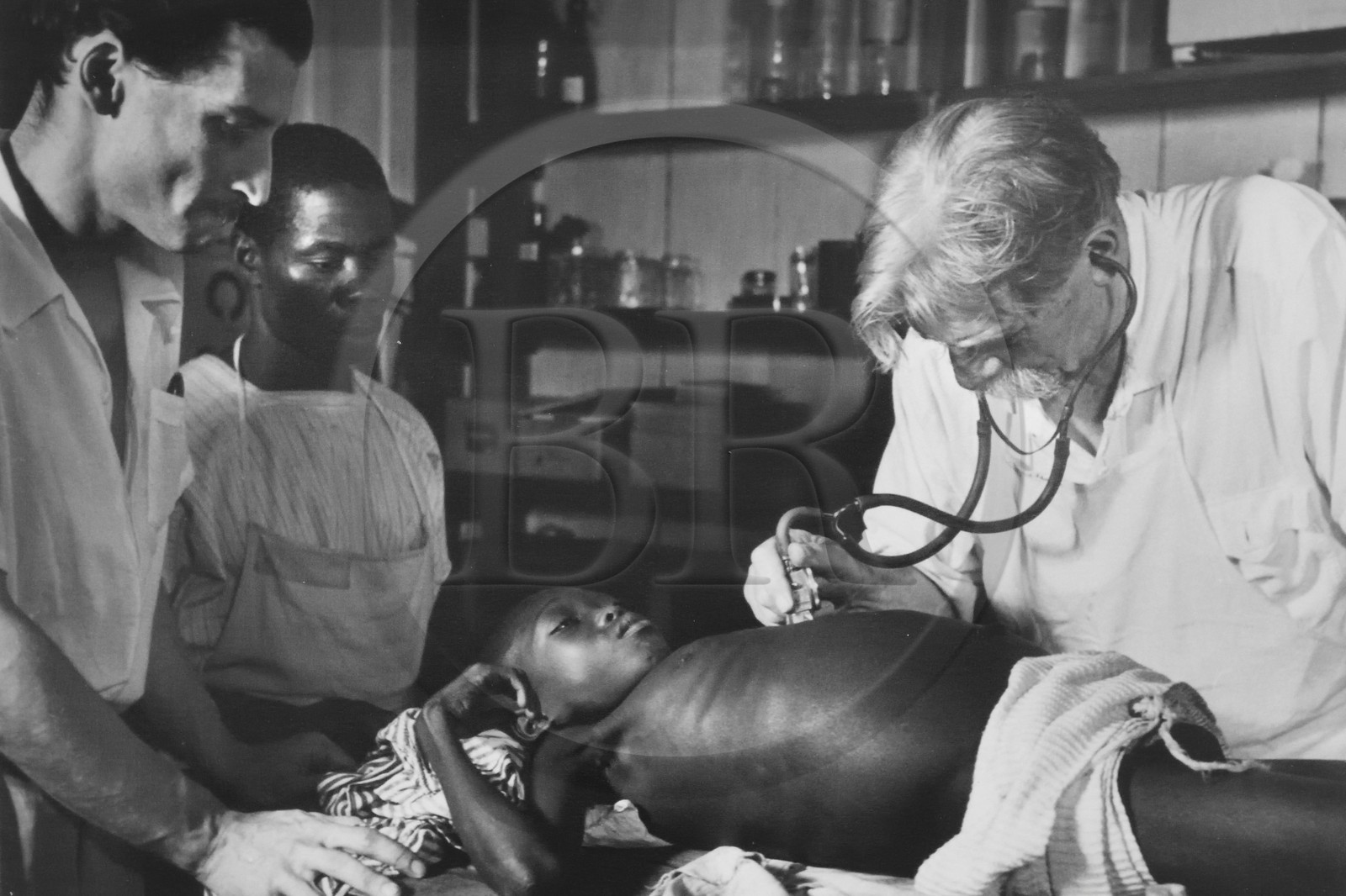 Gabon, Moyen-Ogooué Province, Lambaréné, Albert Schweitzer Hospital, Albert Schweitzer with Dr. Percy and nurse Pierre Piebye listening to a patient's chest (archive picture)
