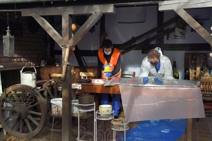 France, Bas-Rhin, Schiltigheim, intervention of two engineers from the National Agency for the Management of Radioactive Waste (Andra) in a private home to remove radioactivity from a rare model of a century-old radium fountain