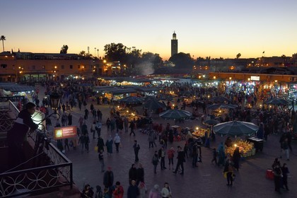 Morocco, High Atlas, Marrakech, Imperial city, Medina listed as World Heritage by UNESCO, Jemaa el-Fna square and the minaret of the Koutoubia mosque in the background
