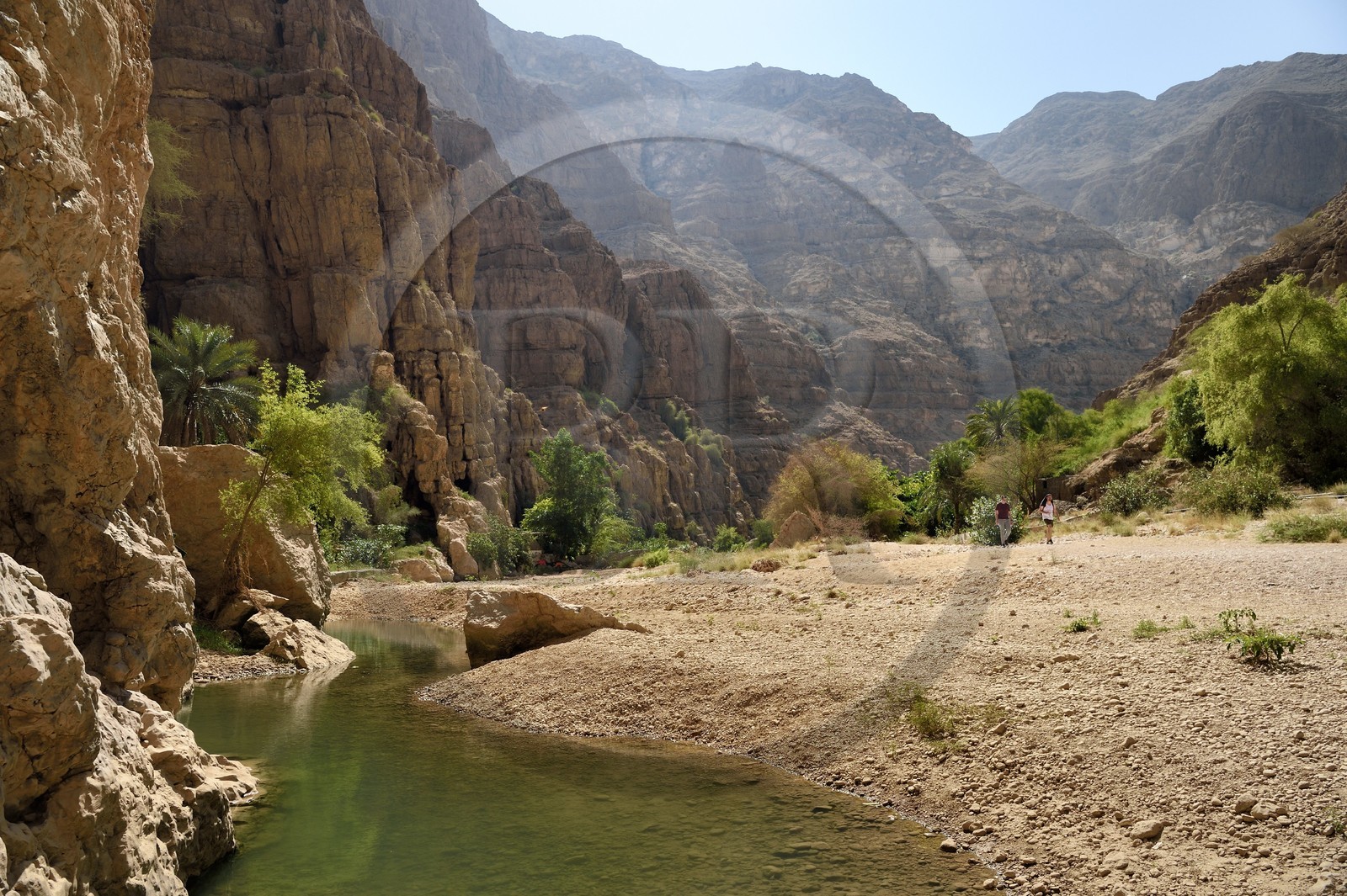 Sultanate of Oman, Ash Sharqiyah region, Bimmah, hikers in Wadi ash Shab