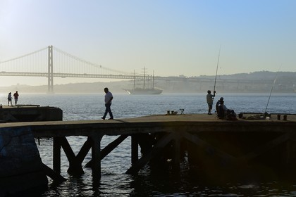 Portugal, Lisbon region, municipality of Almada located on Southern bank of Tagus river,  25 de Abril bridge in the background