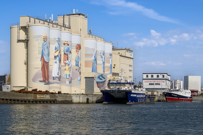 France, Vendee, Les Sables d'Olonne, the port, fresco retracing the history of the city painted on the silos of the Cavac cooperative by the Basque artist Taroe