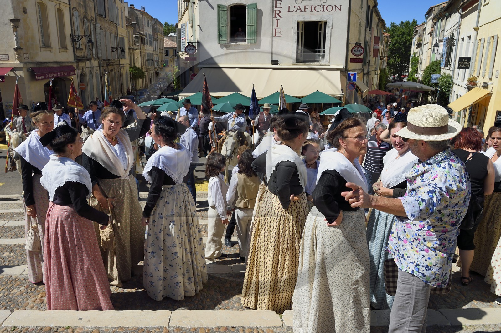 France, Bouches du Rhone, Arles, the course camarguaise of the Cocarde d'Or at the Arenas, Arles inhabitants in traditional costume