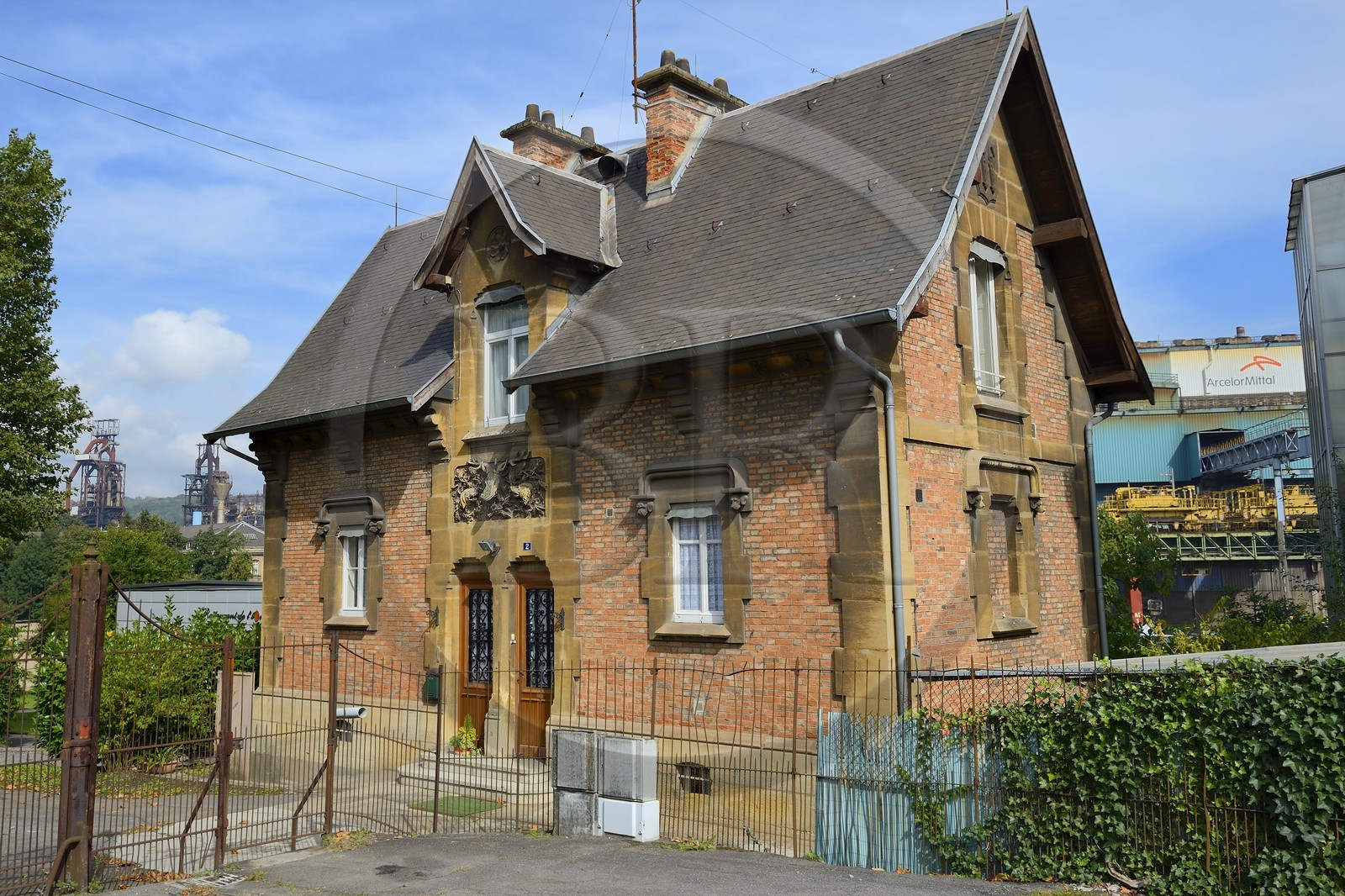 France, Moselle, Fensch Valley, Hayange, steel mill, the last Blast furnaces (known as of Florange) of ArcelorMittal, former gatehouse of the Wendel's castle