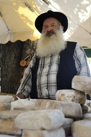 France, Haute Corse, Niolu (Niolo) region, Casamaccioli, shepherd selling his goat cheese at the Santa di Niolu festivity