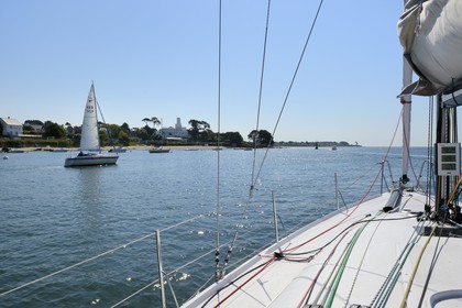France, Finistere, Benodet, the sailboat Pogo 10.50 at the exit of the Odet river estuary