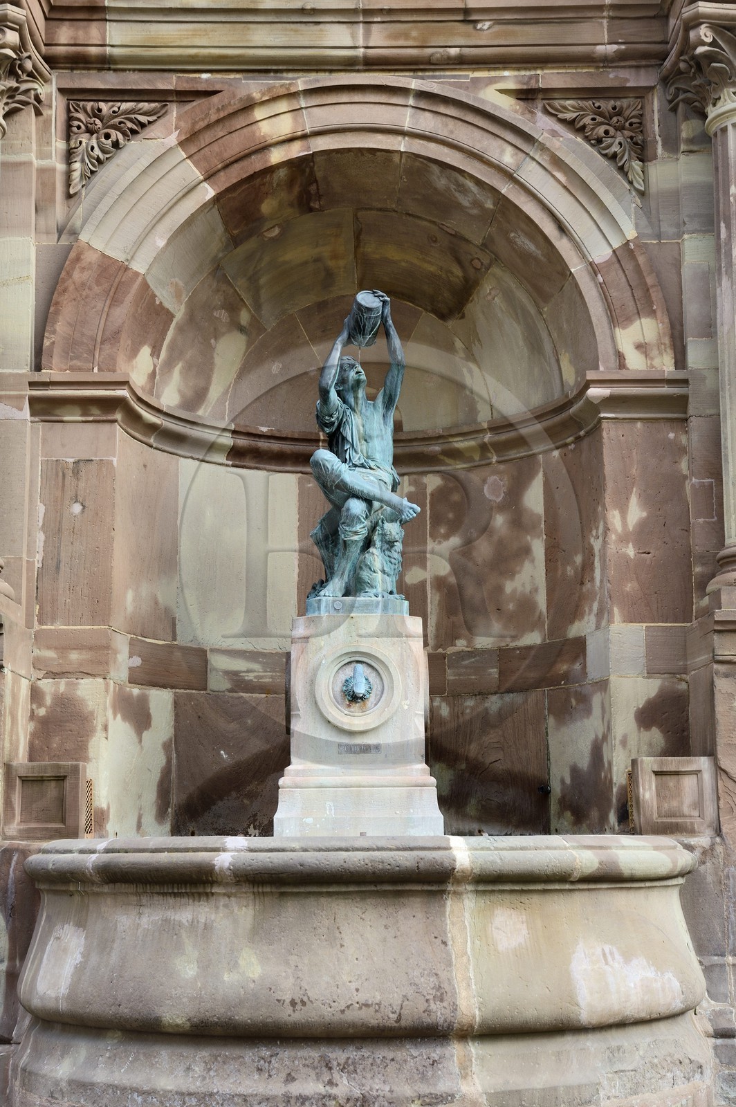 France, Haut Rhin, Colmar, the Little Alsatian Wine grower by Auguste Bartholdi installed in 1869 in a niche fountain housed in the southwestern corner of the Covered Market Hall