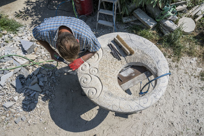 France, Morbihan, Locoal-Mendon, the sculptor and stonemason Gueho Patrick