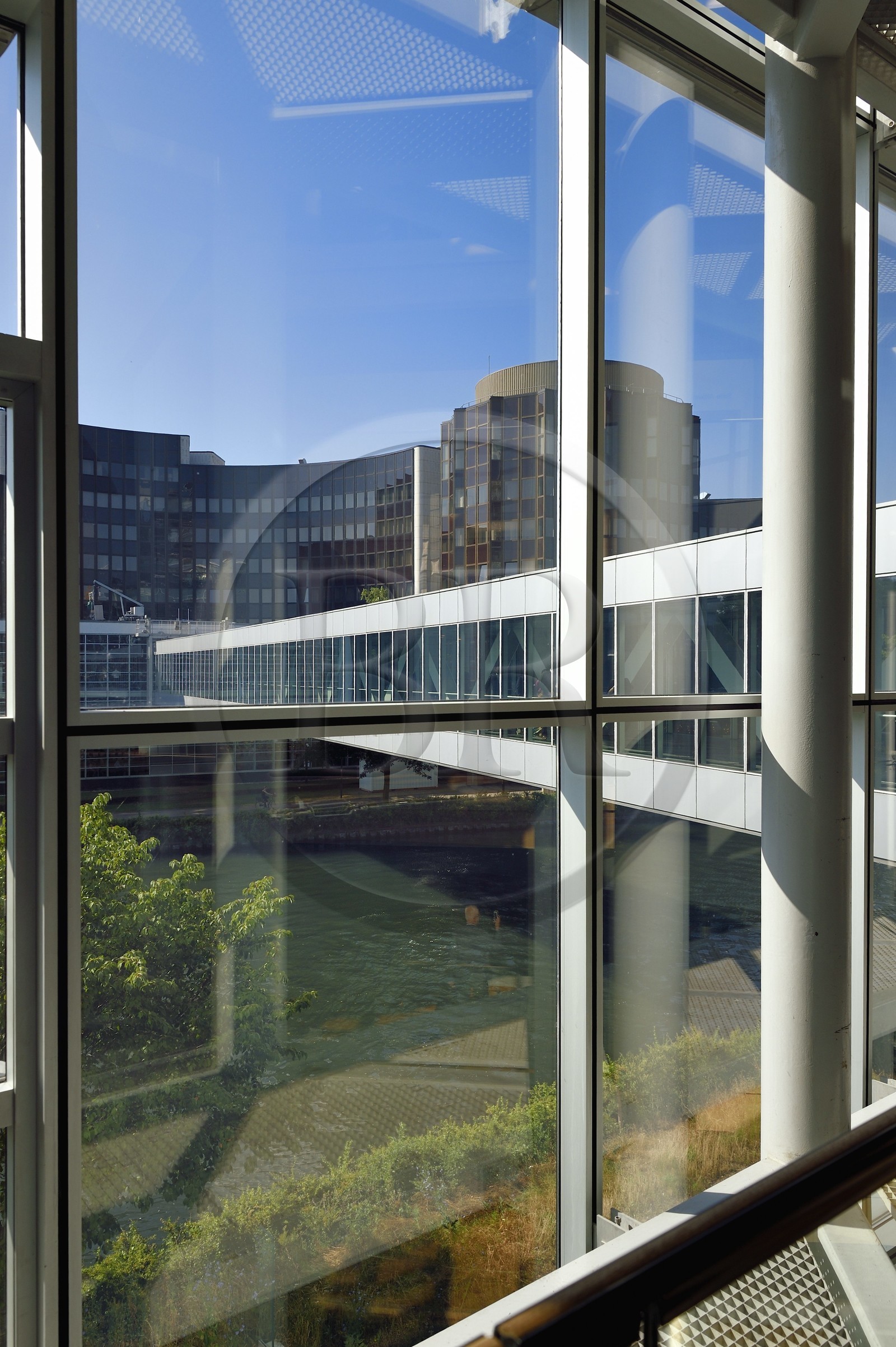 France, Bas Rhin, Strasbourg, European district, the European Parliament, Winston Churchill building connected to the Louise-Weiss building by a footbridge over the Ill river