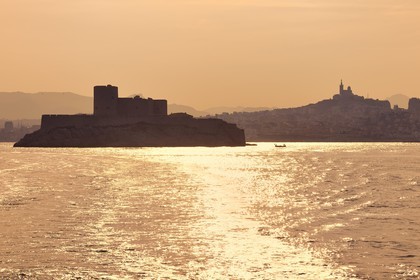 France, Bouches du Rhone, Marseille, Calanques National Park, archipelago of Frioul islands, the Chateau d'If and Notre Dame de la Garde basilica in the background