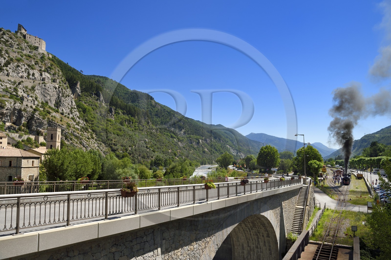 France, Alpes de Haute Provence, Entrevaux Medieval city fortified by Vauban, Train des Pignes historic train under the citadel
