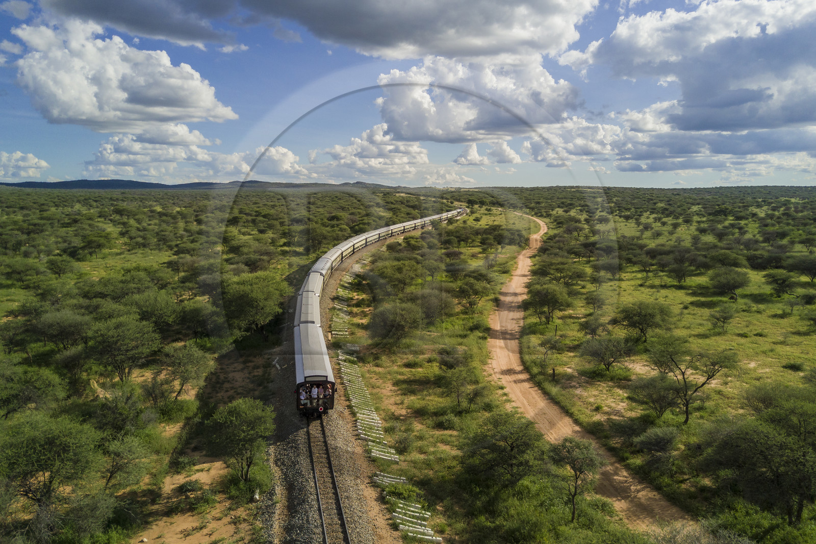 Namibia, Otjozondjupa region, the Shongololo express train crossing the Namibian bush (aerial view)
