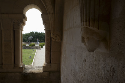 France, Charente Maritime, the former priory of Saint-Jean-l'Evangéliste de Trizay, called the abbey of Trizay, houses a contemporary art center, head support column in the chapter house