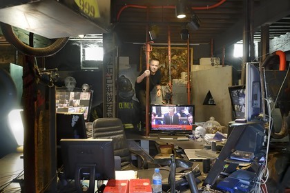 France, Rhone, Saint-Romain-au-Mont-d'Or, the Abode of Chaos (la Demeure du Chaos), the artwork is based around the endless transformation of the artist Thierry Ehrmann's 17th century home into a replica war zone at the image of this world, portrait of Thierry Ehrmann, also CEO and founder of Artprice and the Server group, on his desk