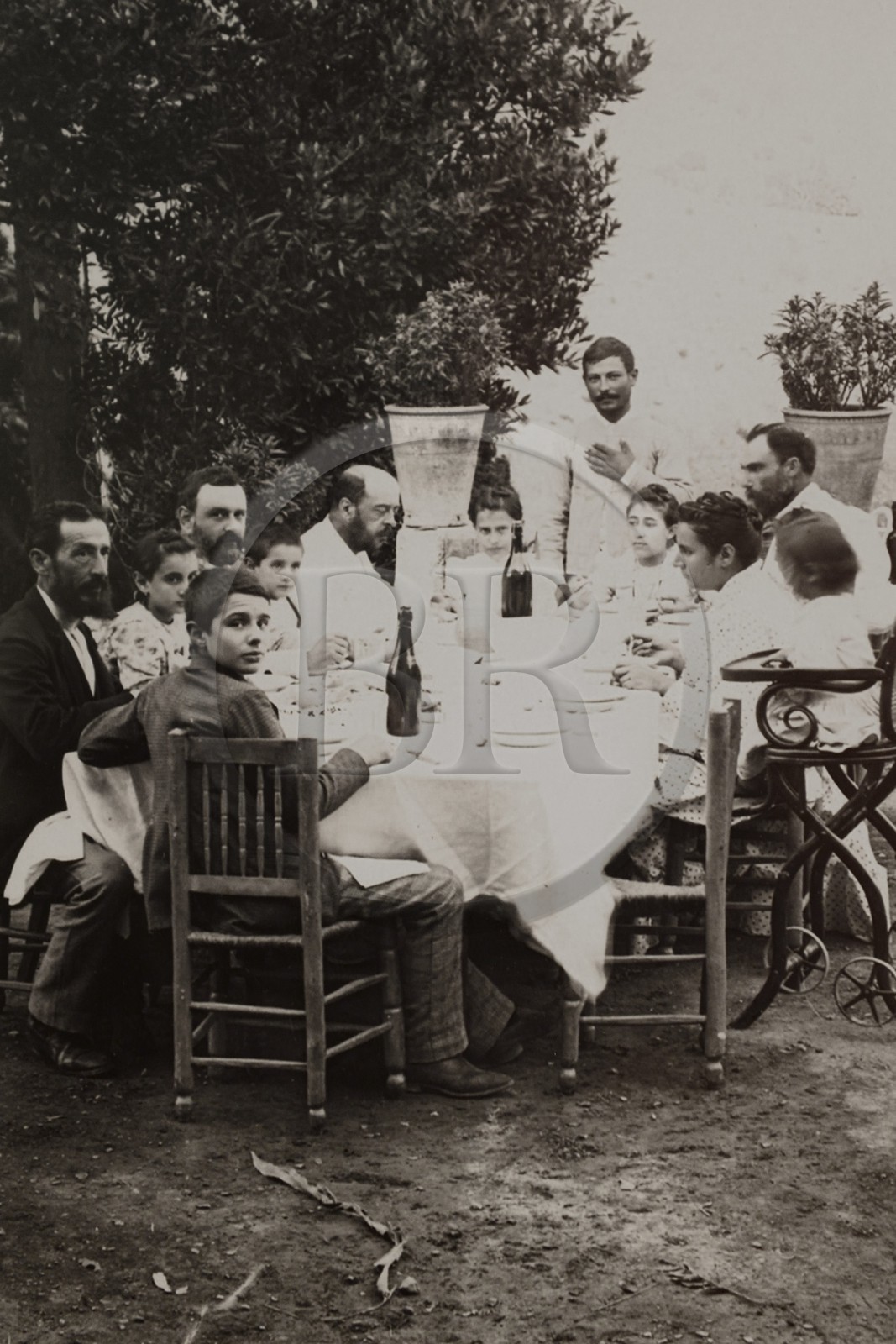 Spain, Andalusia, Malaga, the native house of Picasso, the Picasso Foundation, Pablo Ruiz Picasso in the foreground turned towards the ojectif lens with his godfathers and cousins in Malaga circa 1896, photo by Jose Roman