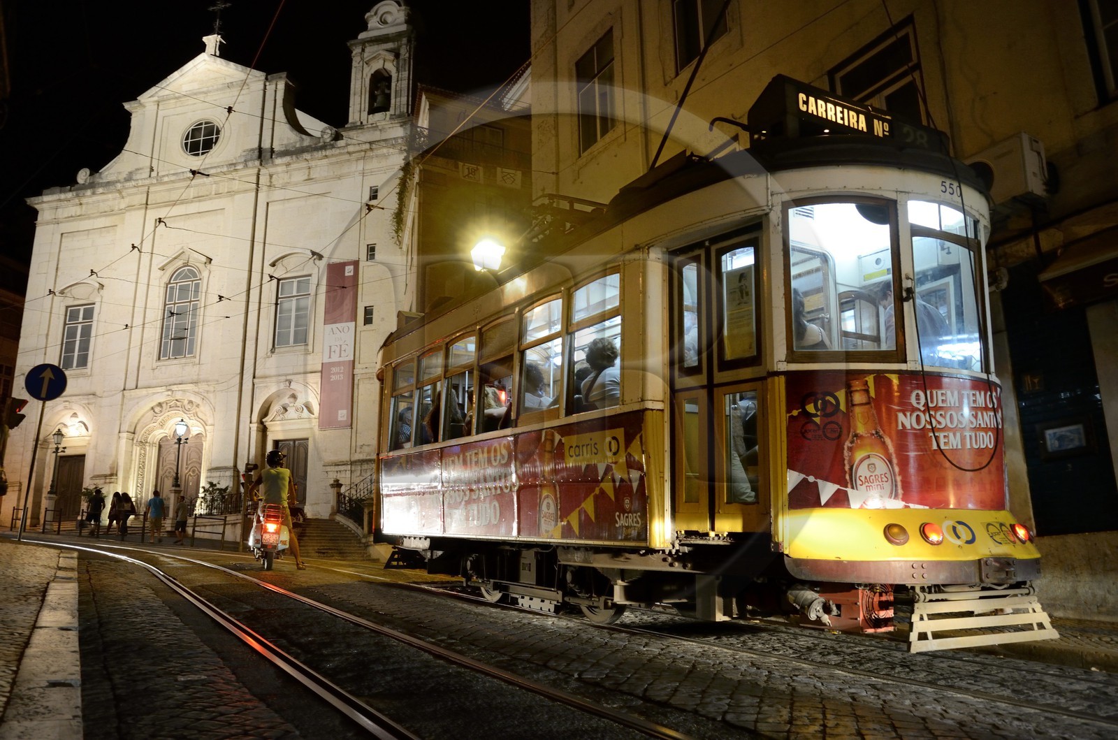 Portugal, Lisbon, Baixa pombalin district, tram in the rua da Conceicao at night