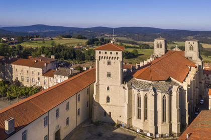 France, Haute Loire, Livradois Forez Regional Natural Park (Parc naturel régional Livradois-Forez), the Chaise-Dieu abbey, apse of the Saint-Robert abbey church and the Clementine tower (aerial view)
