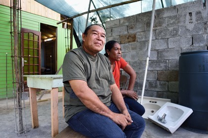Caribbean, Dominica Island, Kalinago Territory only Native American reserve in the Antilles archipelago, Touna Auté village, the former Kalinago chief Irvince Auguiste and his wife Louisette, in the construction site of his house destroyed by Hurricane Maria in 2017