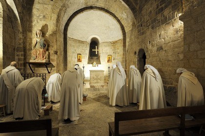 France, Manche, the abbey of Mont Saint Michel, listed as World Heritage by UNESCO, Abbey Church, brothers and sisters of the Monastic Fraternities of Jerusalem, the Lauds in the chapel of Trentes Cierges