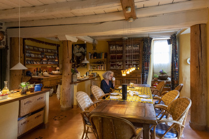 France, Haute-Loire (43), Bouchet-Saint-Nicolas, hiking with a donkey on the Robert Louis Stevenson Trail (GR 70), Marie welcomes us to her guest house Le Potala