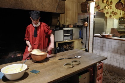 France, Manche, Mont Saint Michel, the restaurant called La Mere Poulard, preparation of the famous omelette