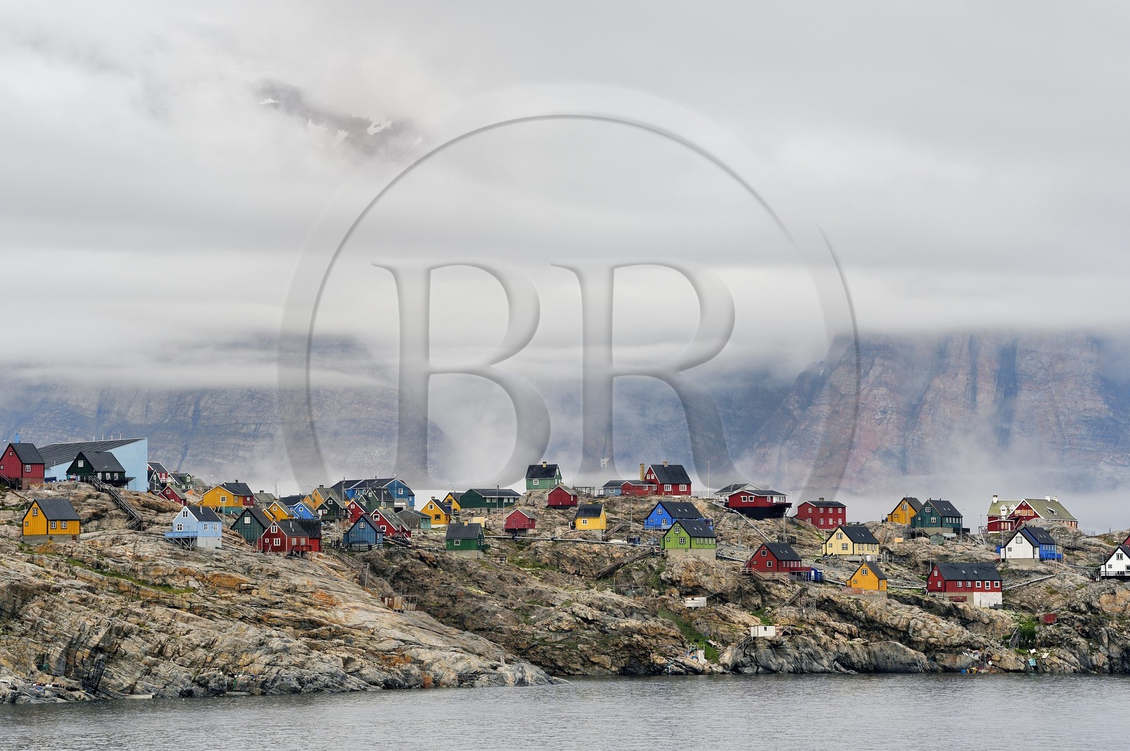 Greenland, west coast, Baffin bay, the town of Uummannaq clinging to the rock