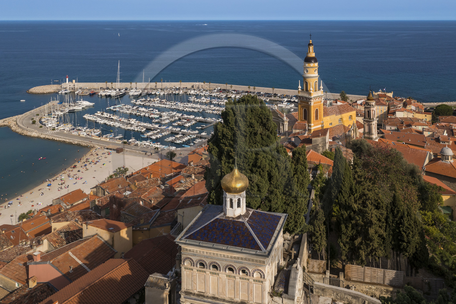 France, Alpes-Maritimes, Menton, old town, the Old Castle cemetery, marine cemetery, Orthodox chapel built in 1884 by Count-Protasov Bechmetieff, the Basilica of Saint Michel and the port in the background (aerial view)