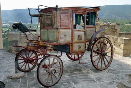 France, Vaucluse, Parc Naturel Regional du Luberon (Natural Regional Park of Luberon), Lourmarin, labelled Les Plus Beaux Villages de France (The Most Beautiful Villages of France), Lacoste, Lacoste castle, one of the residences of the Marquis de Sade and nowadays owned by Pierre Cardin, old stagecoach