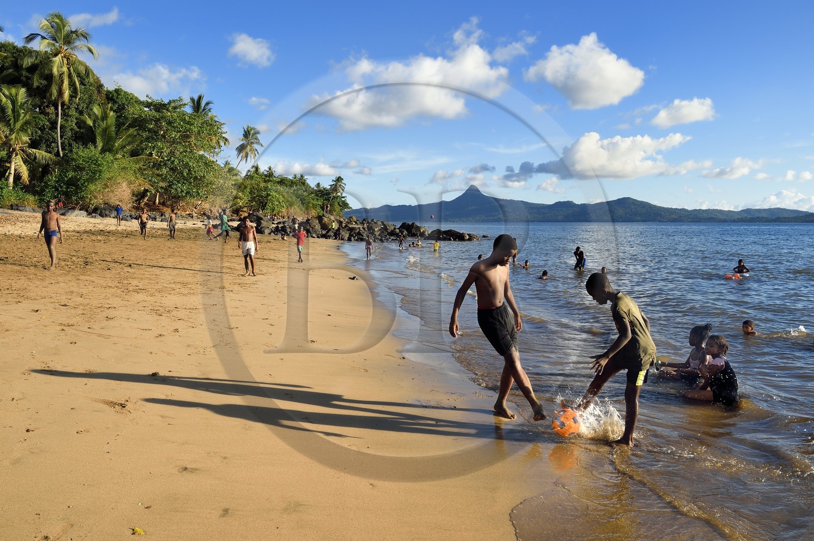 France, Mayotte island (French overseas department), Grande-Terre, Sada, kids playing football on Tahiti beach (Mtsagnougni) in the Bay of Boueni