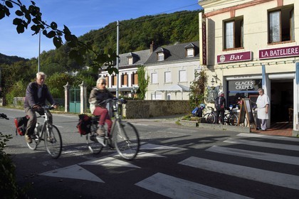 France, Eure, the village of Bas-Caumont in the norman Seine river meanders, cyclists passing the Bar and Restaurant La Bateliere from Brigitte et Raymond Godebout on the Veloroute of Val de Seine