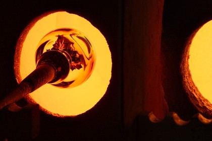 France, Moselle, Saint-Louis-les-Bitche, the Cristallerie Saint-Louis (Saint-Louis crystal glass manufacturer), shaping a hot crystal element, one of the many steps of the realization of a paperweight