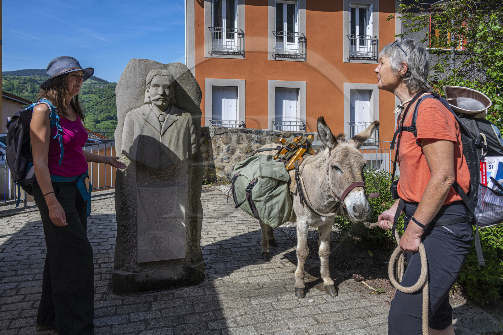 France, Haute-Loire (43), Le Monastier-sur-Gazeille, hiking with a donkey on the Robert Louis Stevenson Trail (GR 70), bust of Robert Louis Stevenson (1850-1894) by sculptor Lucie Delmas