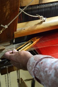 France, Rhone, Lyon, historical site listed as World Heritage by UNESCO, Vieux Lyon (Old Town), Saint George district, Jacquard loom at the silk trade (Soierie) Saint-Georges, shuttle for the passage of gold wire