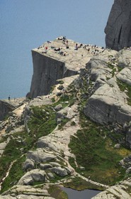 Norway, Rogaland, hikers on the Pulpit Rock (Preikestolen)  in the Lysefjord - fjord of Lysebotn (aerial view)