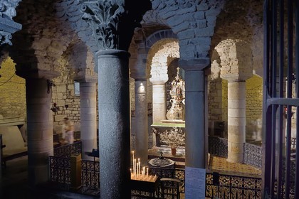 France, Puy de Dome, Clermont Ferrand, Notre-Dame-du-Port basilica in Auvergne Romanesque style, listed as a UNESCO World Heritage Site under the Routes of Saint-Jacques-de-Compostelle in France, the crypt which houses the Black Madonna on her altar as well as a very old well