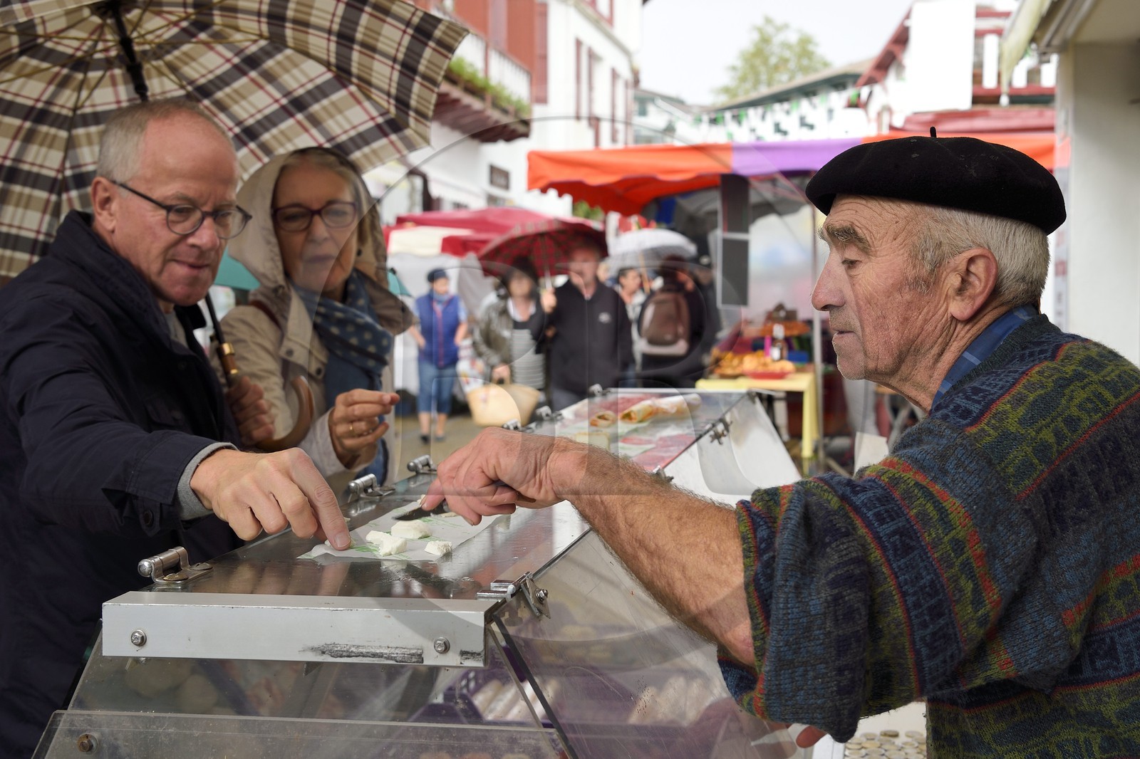 France, Pyrenees Atlantiques, Basque Country, Cambo les Bains, market day, Mr. Indart coming from Macaye selling his goat cheese on the market