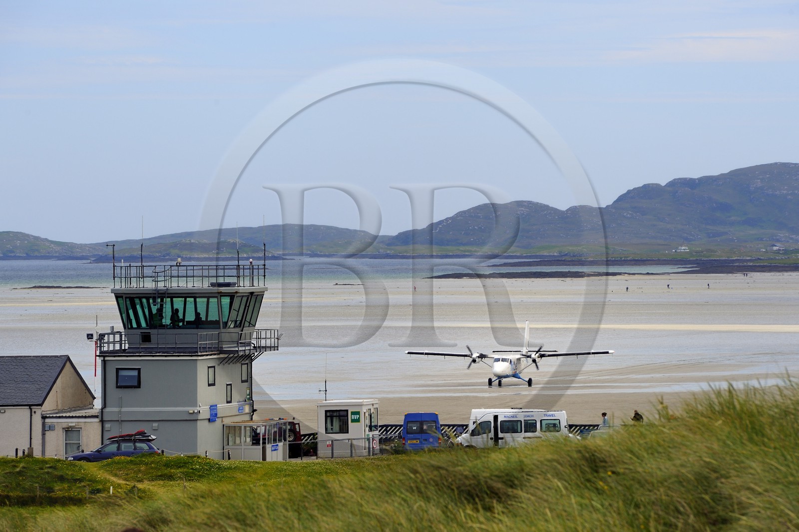 United Kingdom, Scotland, Outer Hebrides, Isle of Barra, Twin Otter landing at Barra Airport, the runway is the beach at low tide