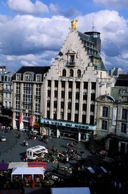 France, Nord, Lille, famous building from the newspaper la Voix du Nord and the flowers market on general de Gaulle square (Grand' Place)