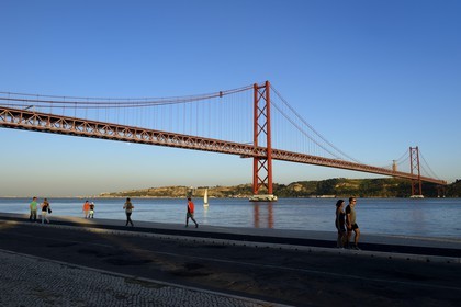 Portugal, Lisbon, 25 de Abril bridge on Tagus river and the Cristo Rei (Christ the King)