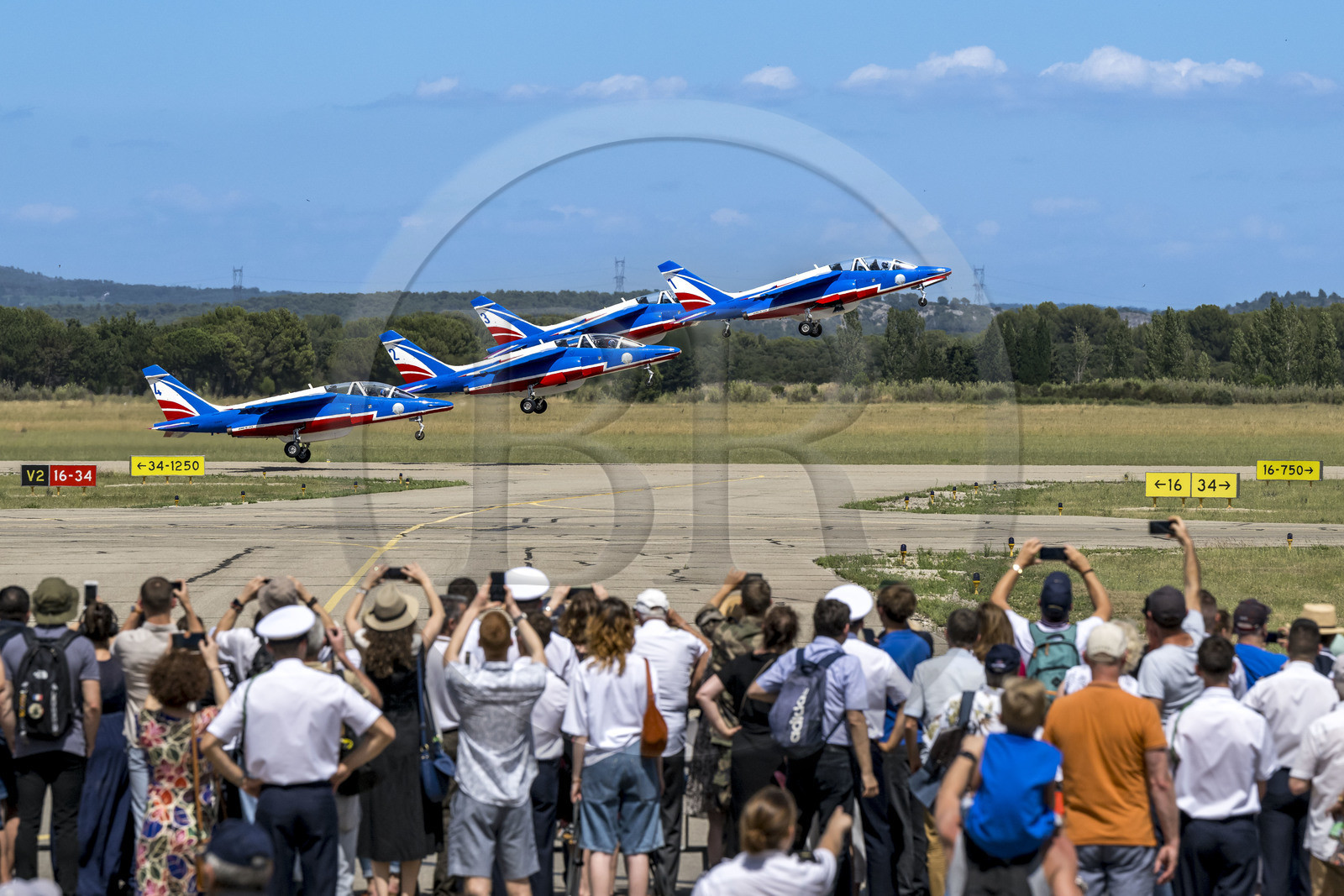 France, Bouches du Rhone, Salon de Provence, air base 701, base of the Patrouille de France (PAF for Patrouille acrobatique de France) of the French Air and Space Force, aerial demonstrations in the presence of the families of the student officers for the Echange des Gardes ceremony, Alphajet aircraft take off for a performance