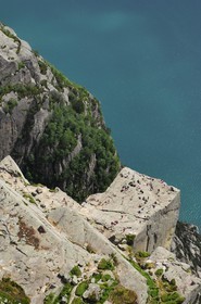 Norway, Rogaland, hikers on the Pulpit Rock (Preikestolen)  in the Lysefjord - fjord of Lysebotn (aerial view)