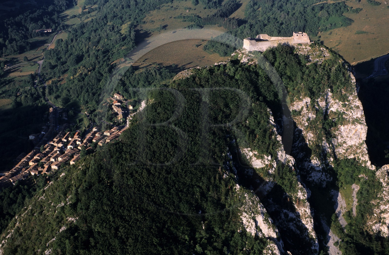 France, Ariege, Pays d' Olmes, Cathar Castle of Montsegur perched on rock (aerial view)